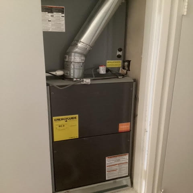 HVAC system with EnerGuide label, showcasing air handler and ductwork, representing Dale-Air's heating and air conditioning services in San Diego.