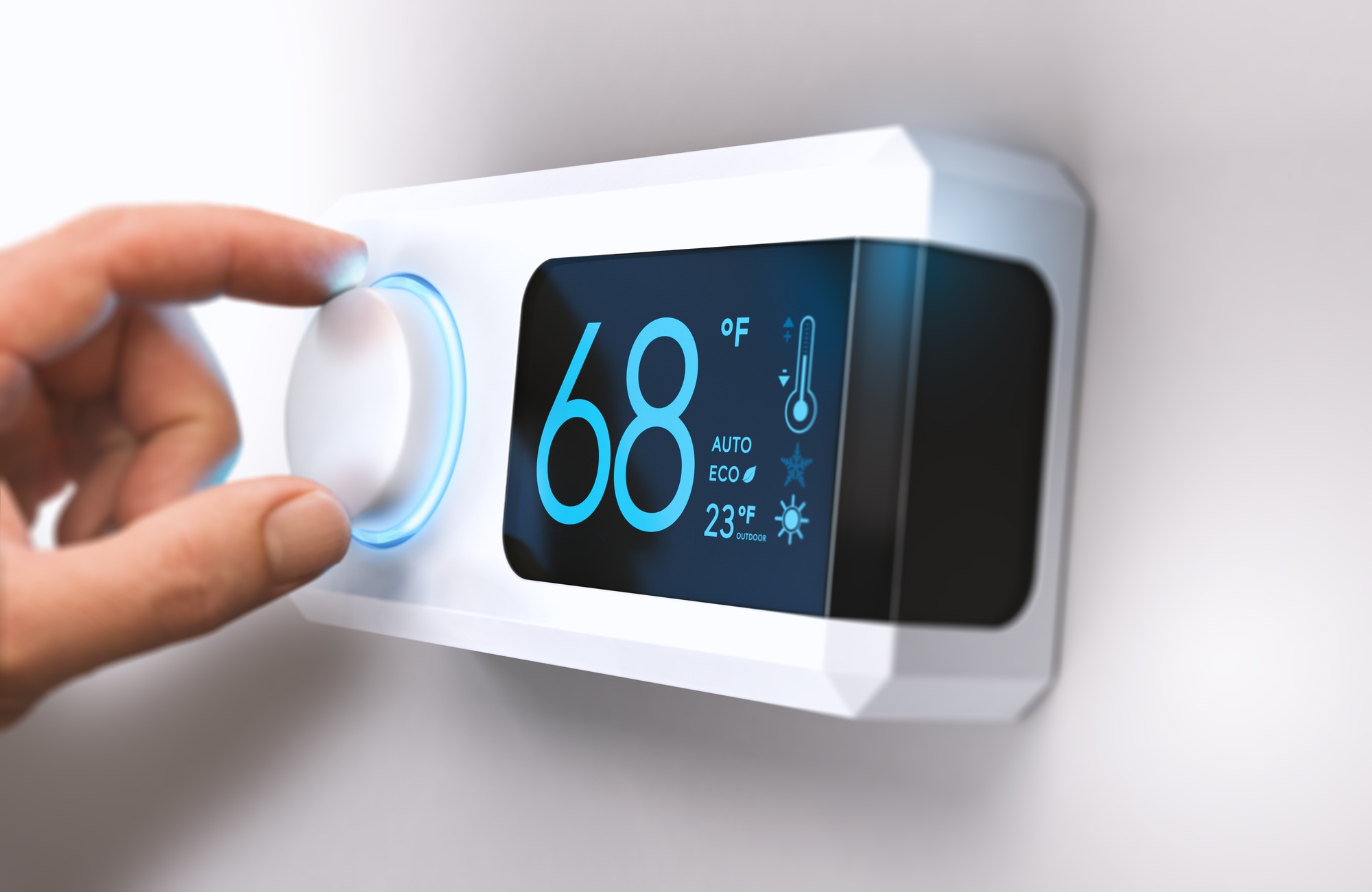 Hand adjusting a smart thermostat displaying 68°F, highlighting energy efficiency and temperature control for home cooling systems.